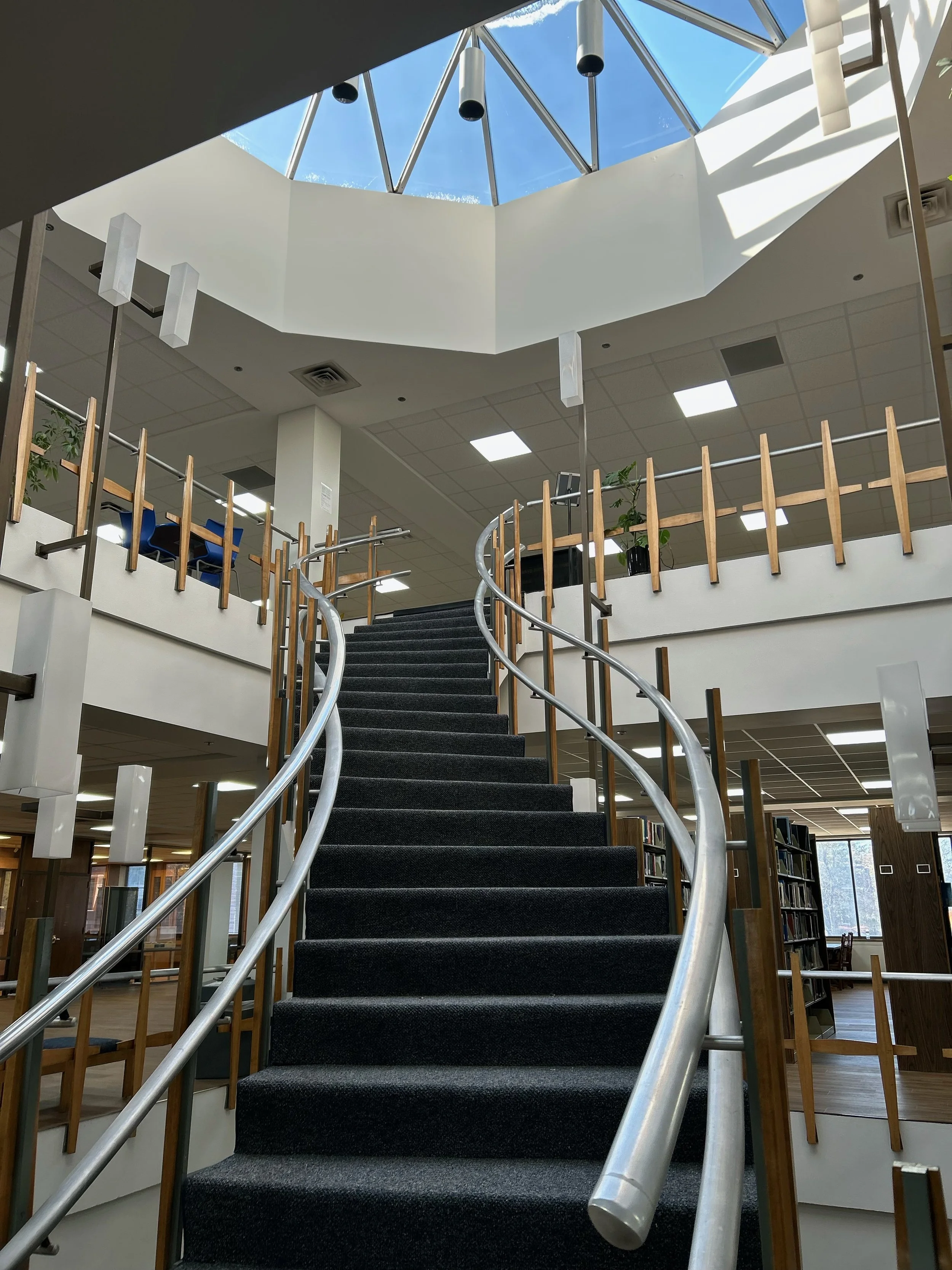 Multi-level library cleaned and maintained professionally.