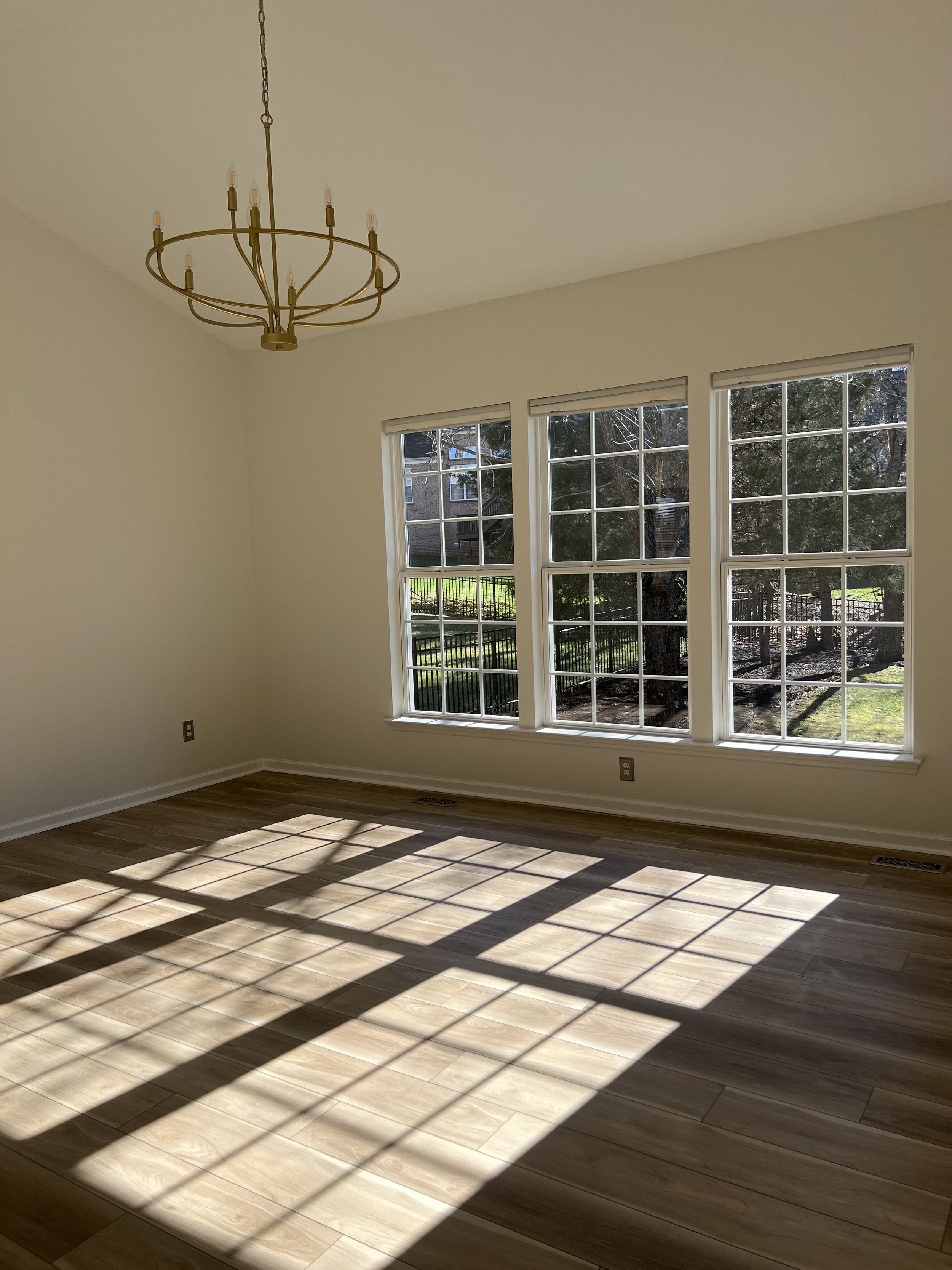 Bright living room refreshed and prepared after detailed house cleaning.