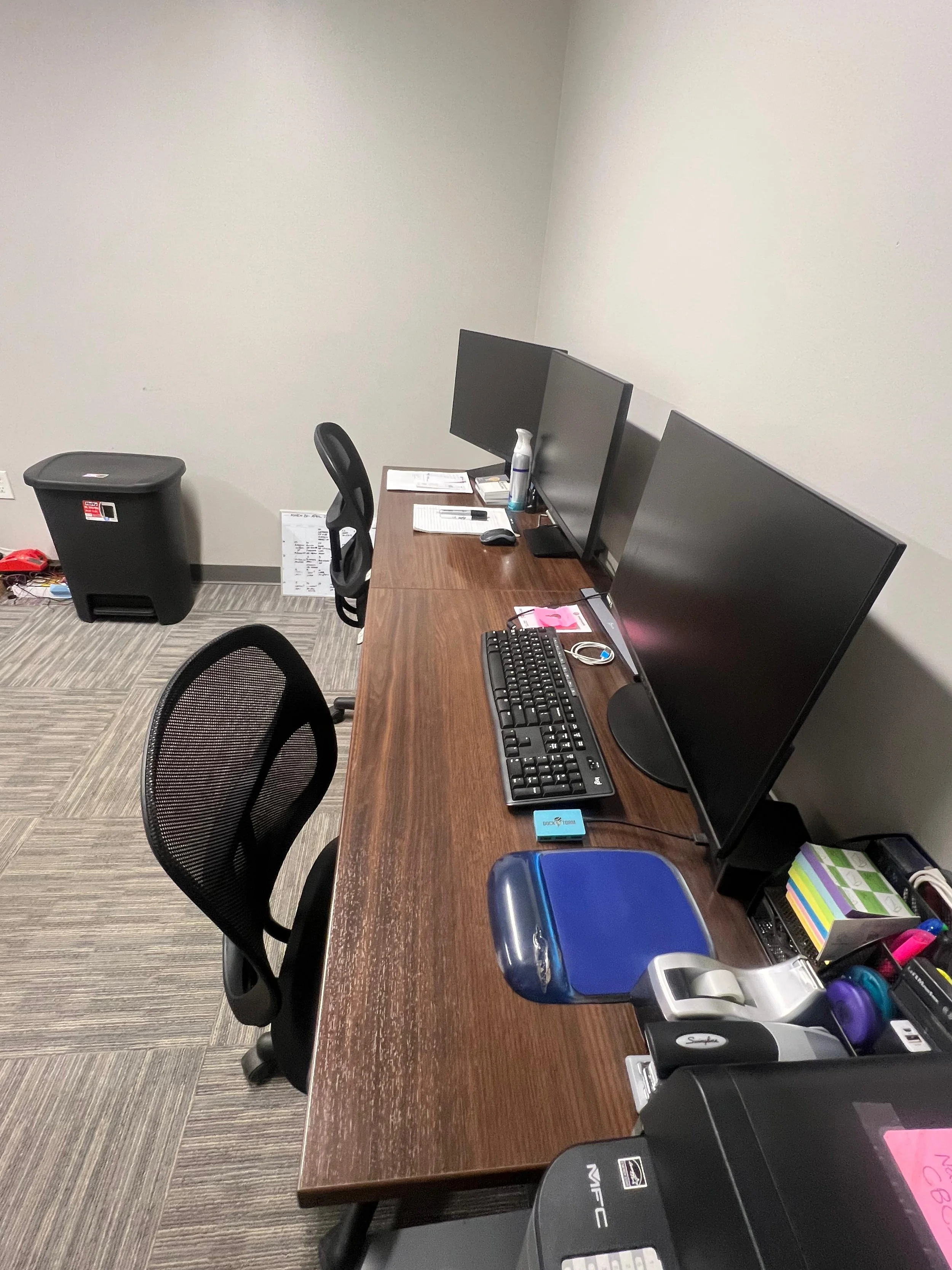 Office workspace cleaned and sanitized during commercial cleaning service.