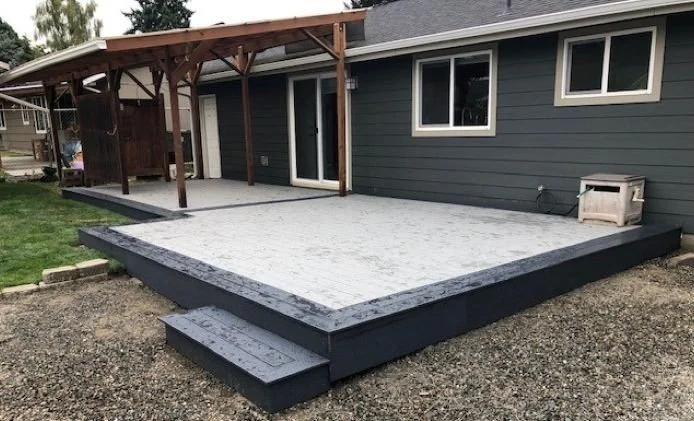 Custom PVC deck construction in Auburn featuring low-maintenance decking, integrated steps, and a covered outdoor living area designed for year-round enjoyment.