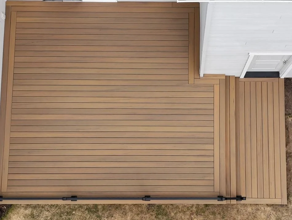 Aerial view of TimberTech composite deck with picture-frame border and stairs in Snoqualmie, WA