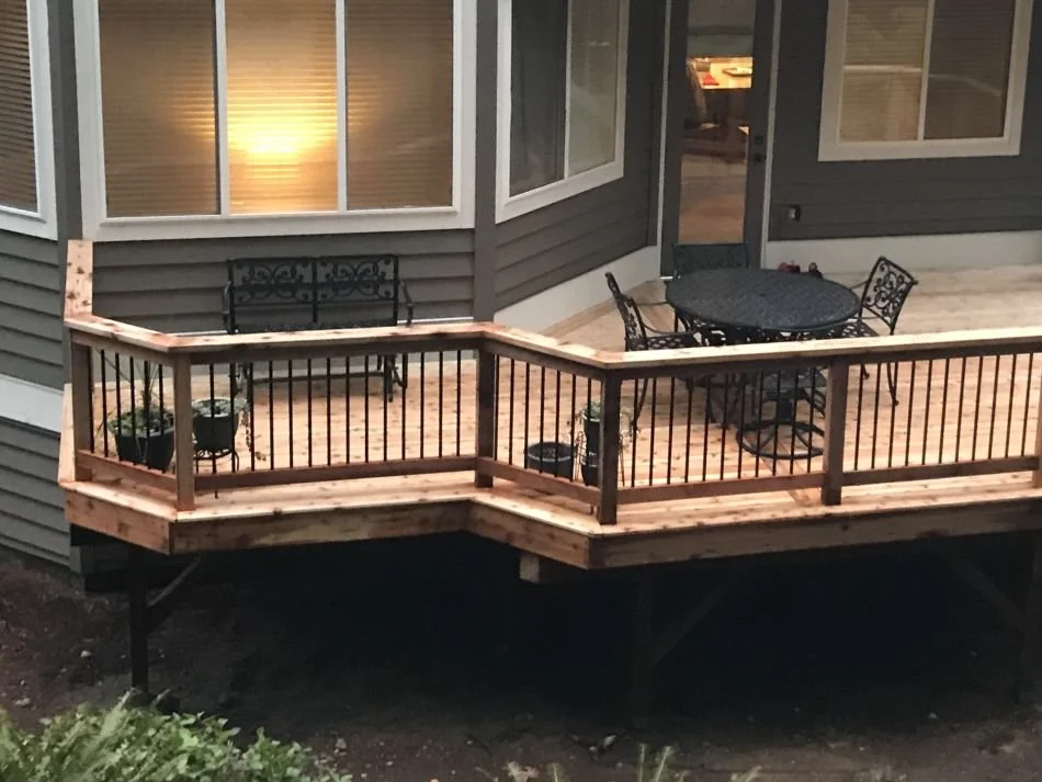 New deck construction in Issaquah WA with cedar decking and railing built for full structural replacement and long-term durability