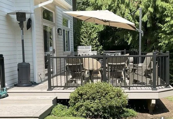 Completed deck renovation in Issaquah WA with AZEK PVC decking and TimberTech metal railings.