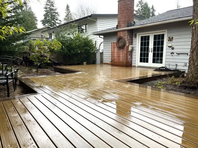 Composite decking material showing uniform boards and consistent surface finish