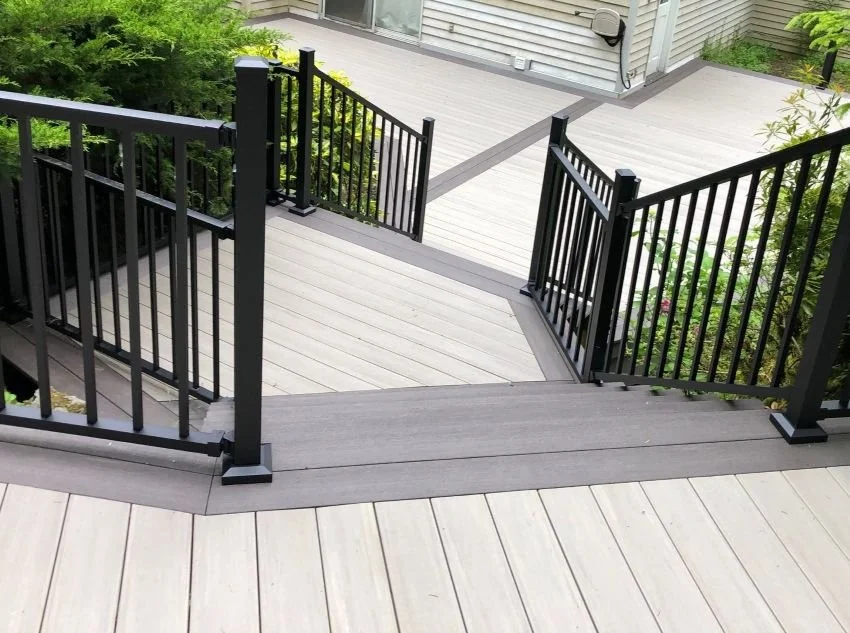 Multi-level deck construction with stairs and structural transitions designed for slope and elevation changes in King County WA
