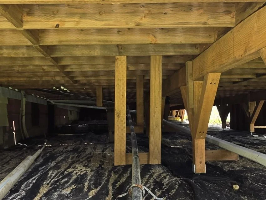 Structural deck replacement with reinforced framing and support posts for an elevated deck in East Renton Highlands, WA.