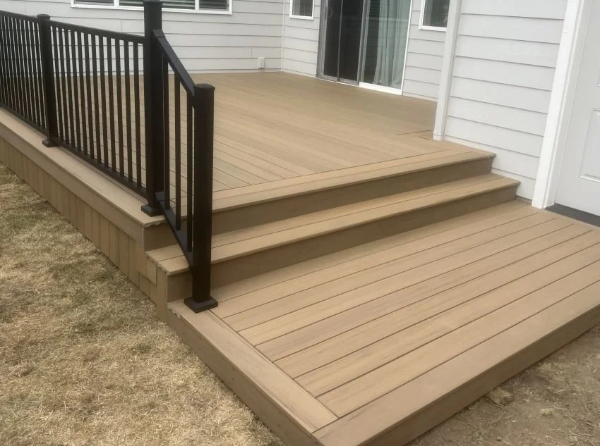 TimberTech composite deck with stairs and black Trex Signature aluminum railing in Snoqualmie, WA