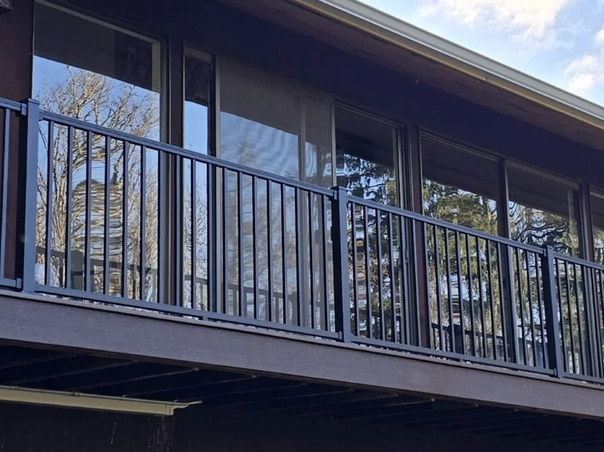 Elevated deck replacement in Maple Valley with black aluminum railing
