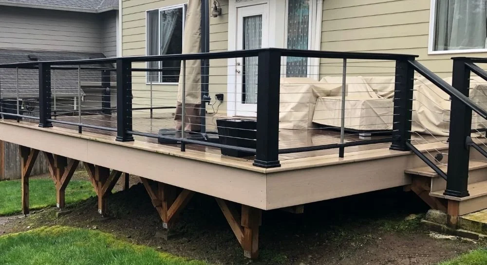 Deck structure with framing, elevation support, and railing system in Kent, WA