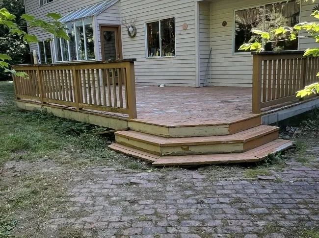 Worn wood deck before replacement in East Hill, Kent, WA