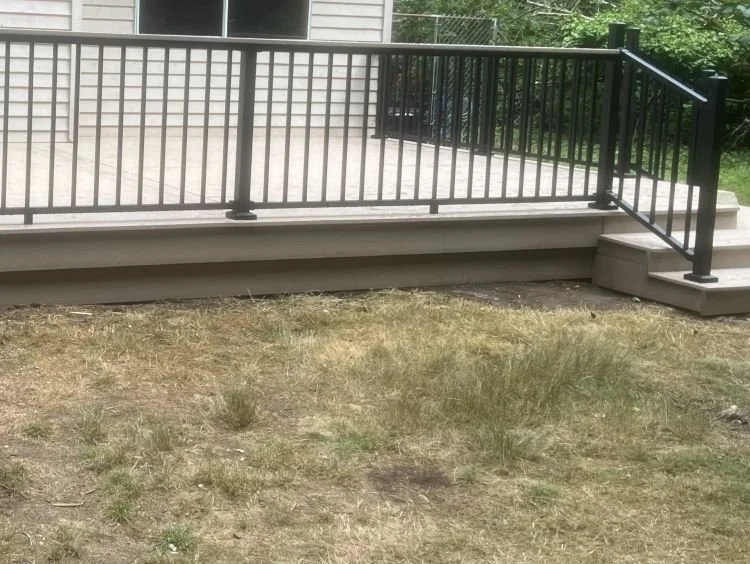 Trex Signature black aluminum railing with cocktail cap rail on TimberTech deck, East Hill, Kent, WA