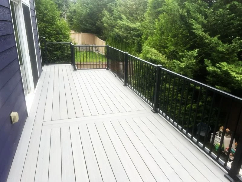 Low-maintenance TimberTech® Prime+ composite decking and black aluminum railing on a completed deck replacement in Snoqualmie, WA.