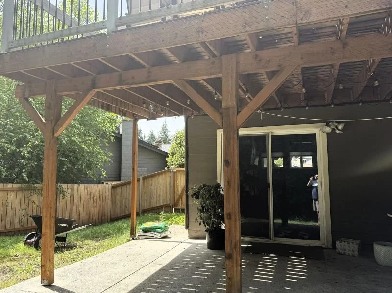 On-site deck evaluation showing exposed framing, beams, and support posts