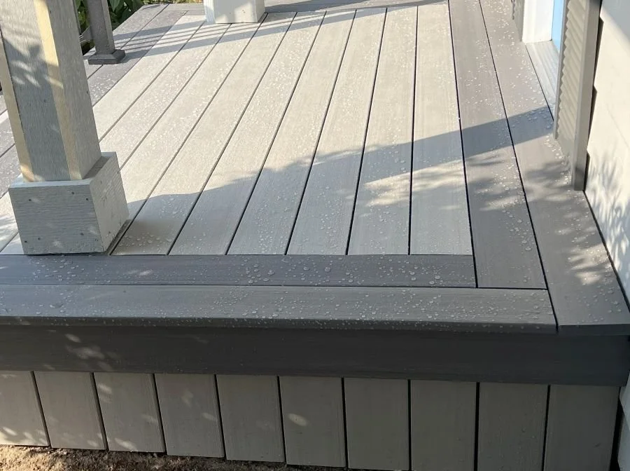 PVC decking surface showing water resistance and low-maintenance performance on a residential deck