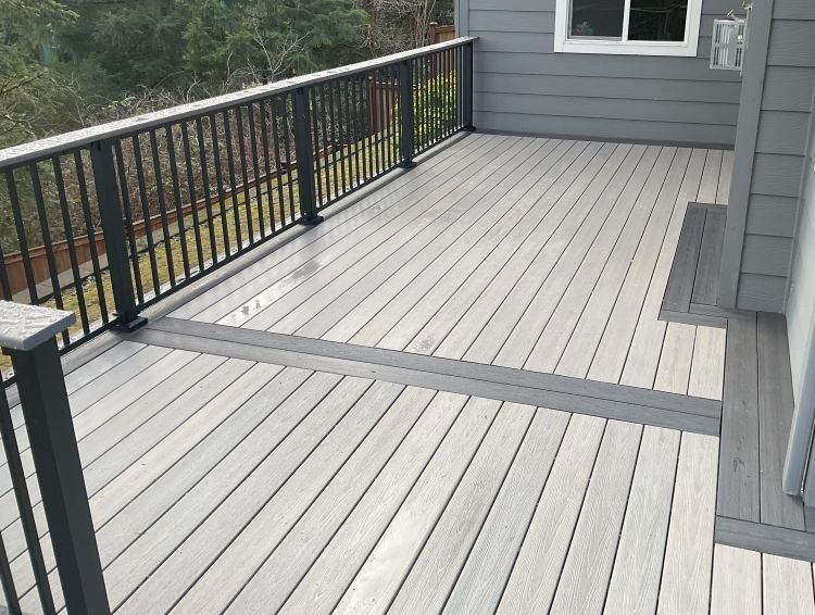Fiberon composite deck with black Trex Signature railing in Newcastle, WA