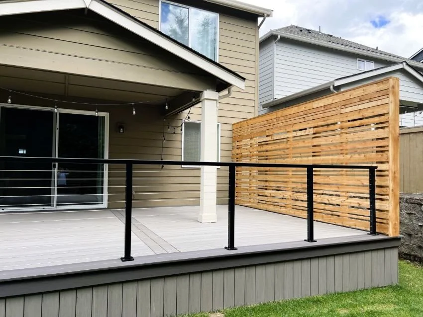 Deck renovation showing improved layout with updated railing and privacy screen