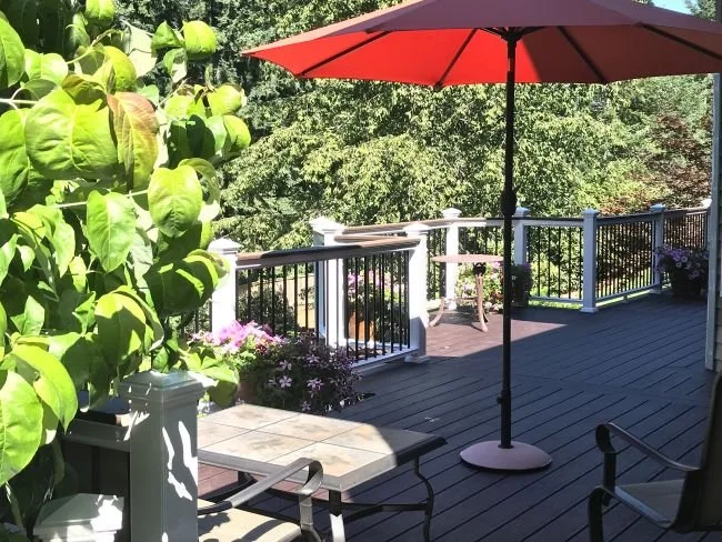 Residential deck with upgraded railings supporting safe everyday use