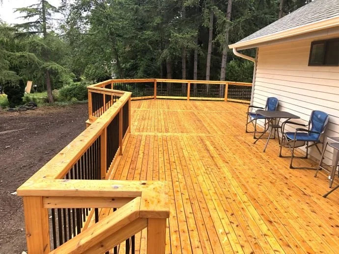 Natural cedar decking material showing wood grain and color variation