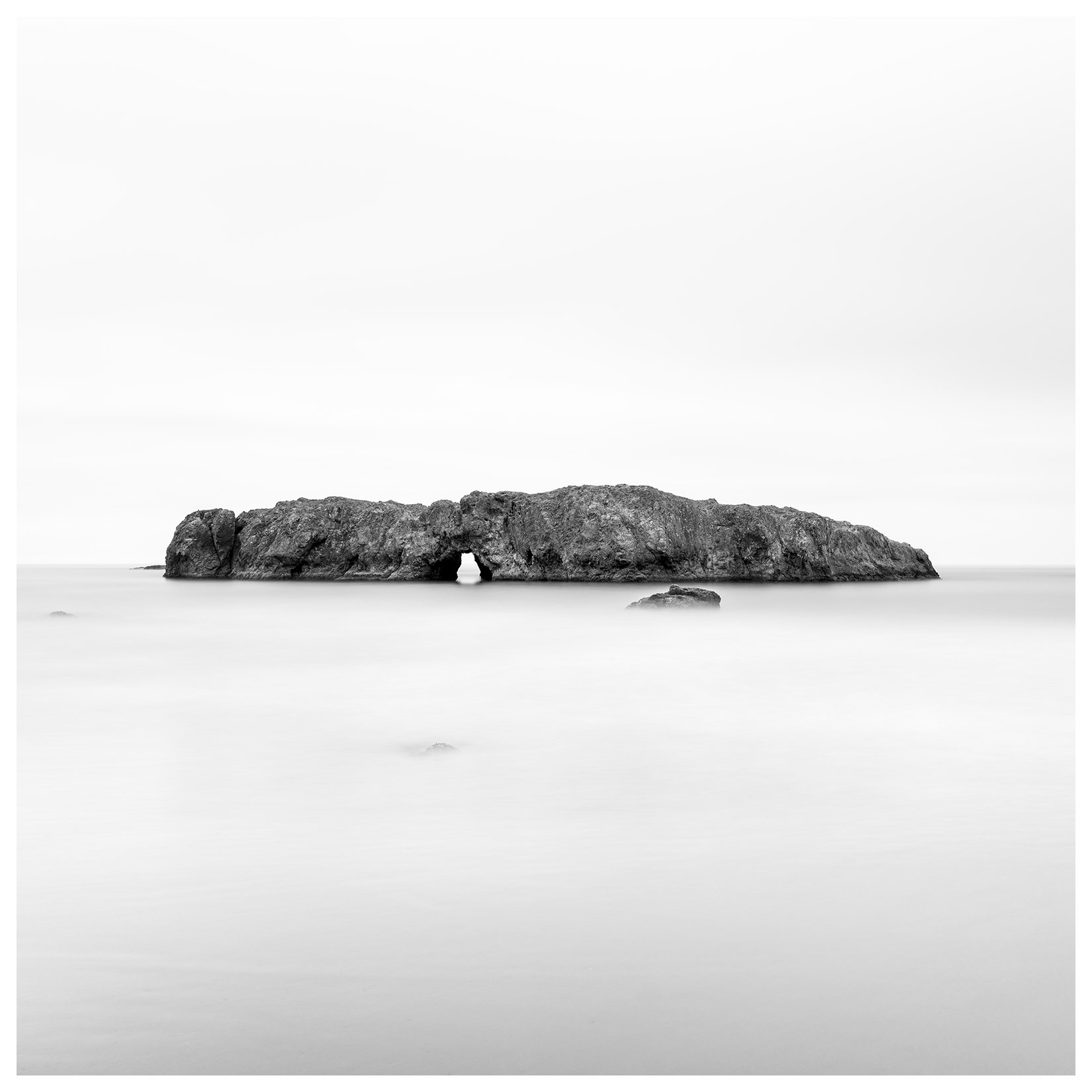Fine Art Black and White Landscape photograph of Cave Rock Arch, Gold Beach, Pistol River, Oregon.