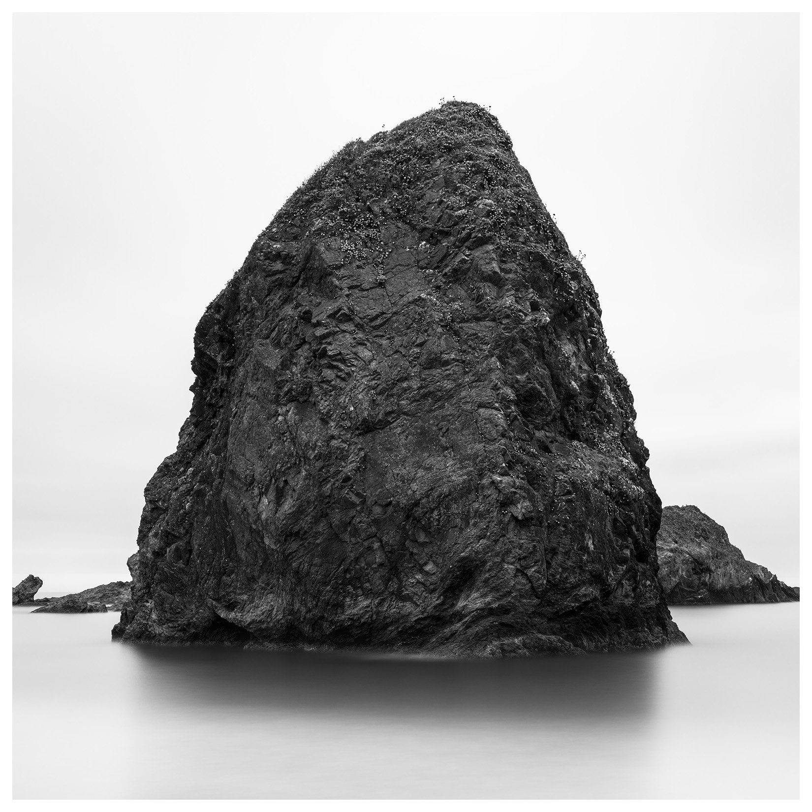 Fine Art Black and White Landscape photograph of sea stack at Gold Beach, Pistol River, Oregon.