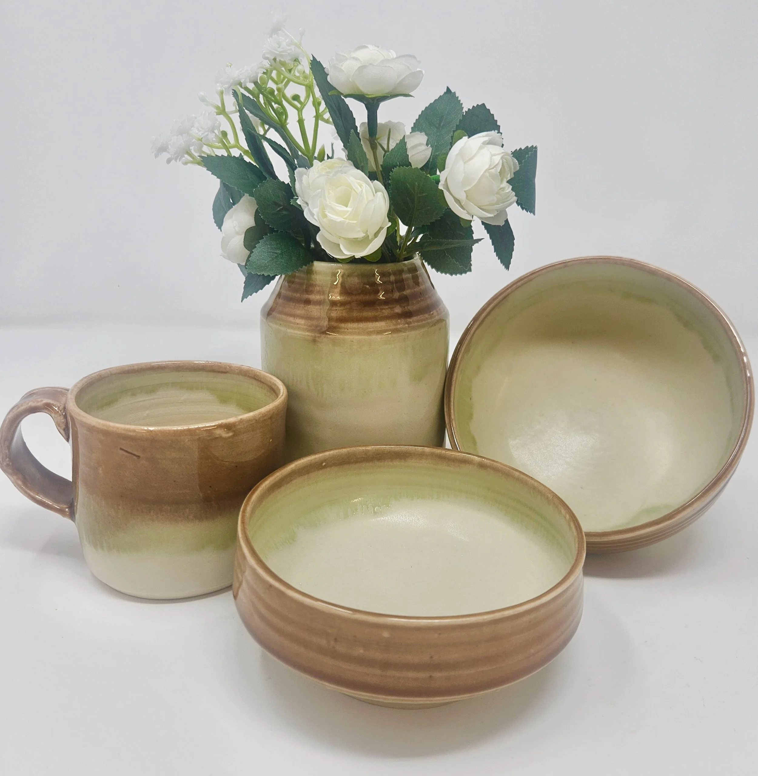 Mills_VaseBowlsMugBrown.jpeg