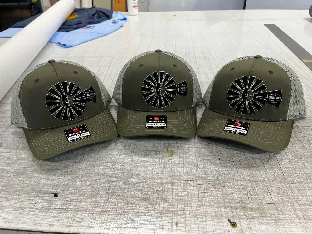 Lasered patches on Richardson hats for Strang, NE