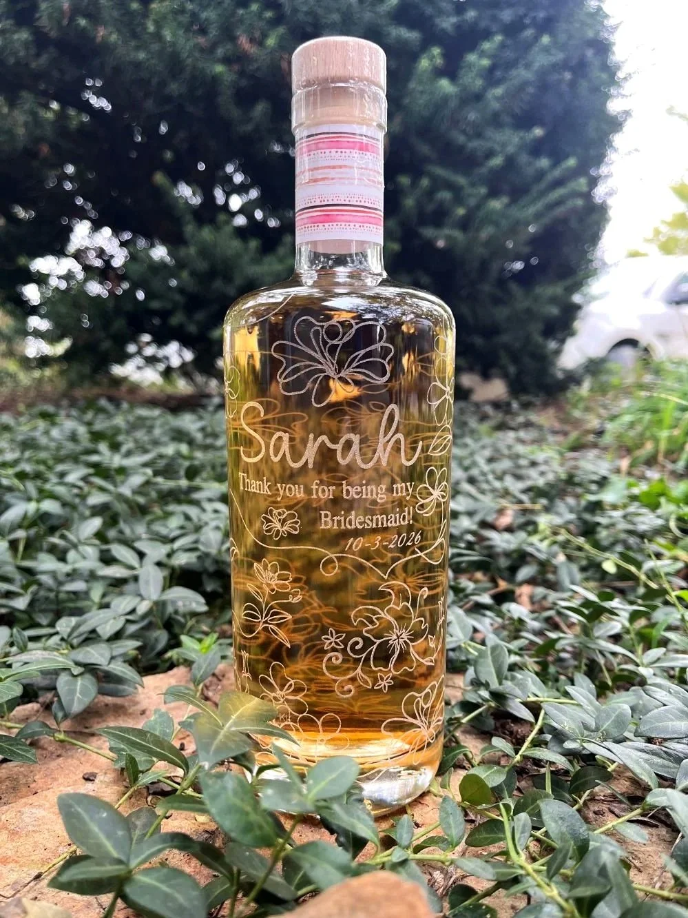 Lasered bottle made for gifts for a wedding party
