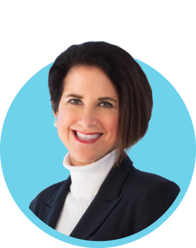 Professional woman with short dark hair smiling, wearing a black blazer and white turtleneck, in front of a blue background with a circular design.