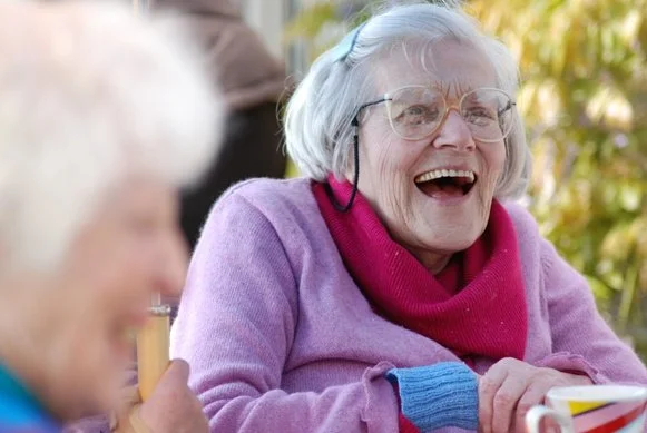 Adult with dysarthria improving speech clarity during therapy
