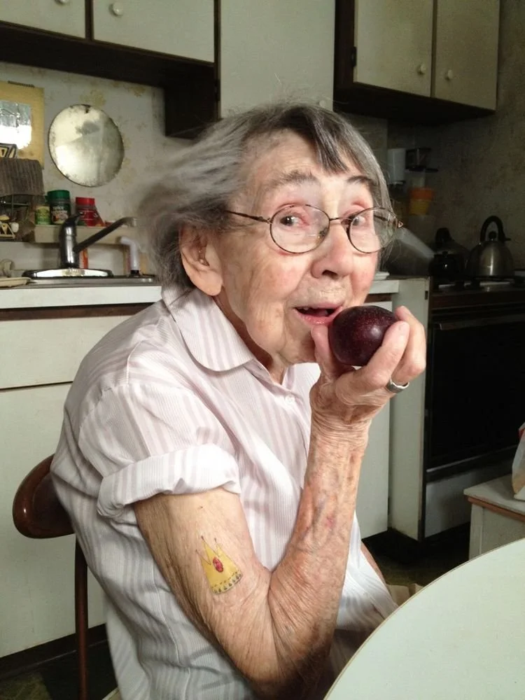 Senior adult with dysphagia practicing safe swallowing techniques with speech therapist