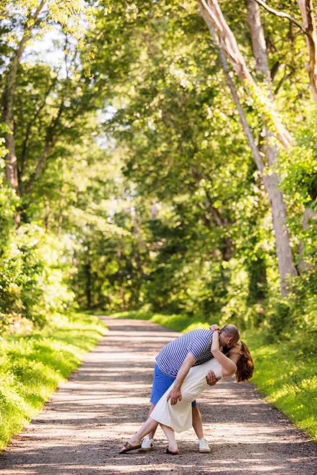 Romantic Candid Engagement Session Kiss Outdoors