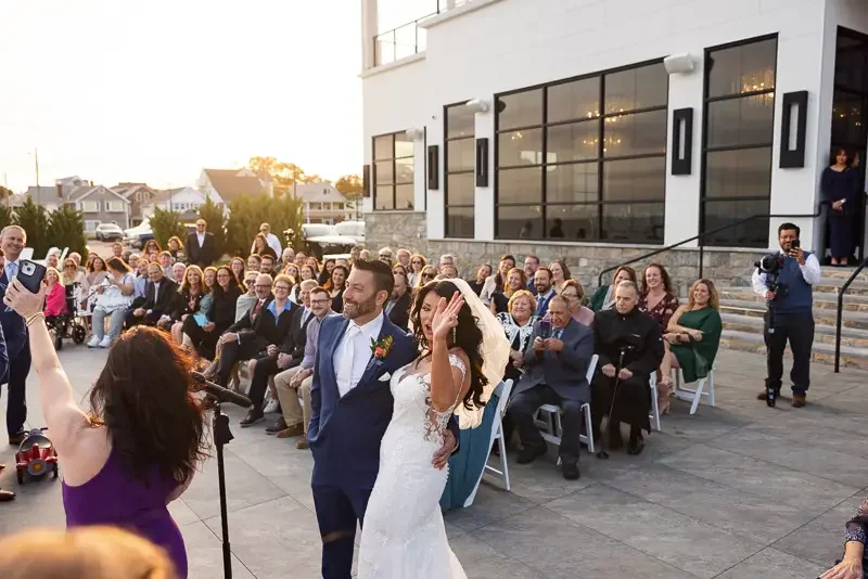 Wedding recessional celebration by the ocean