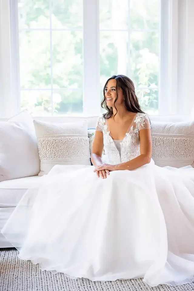 romantic-bridal-portrait-sitting-on-couch.webp