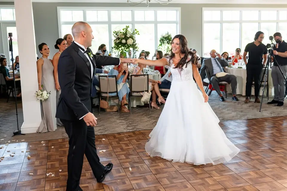 bride-and-groom-first-dance-reception.webp