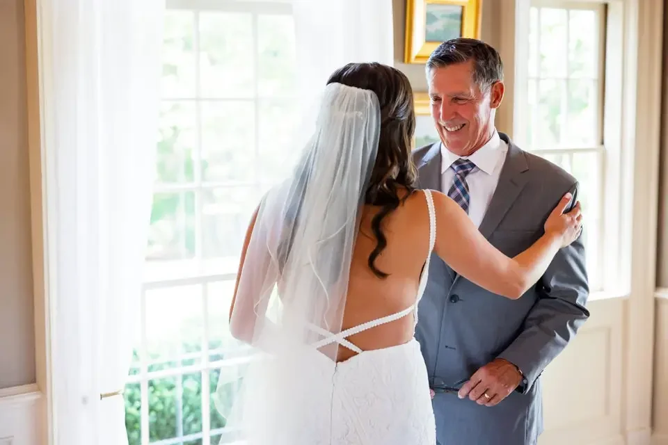 bride-first-look-with-father.webp