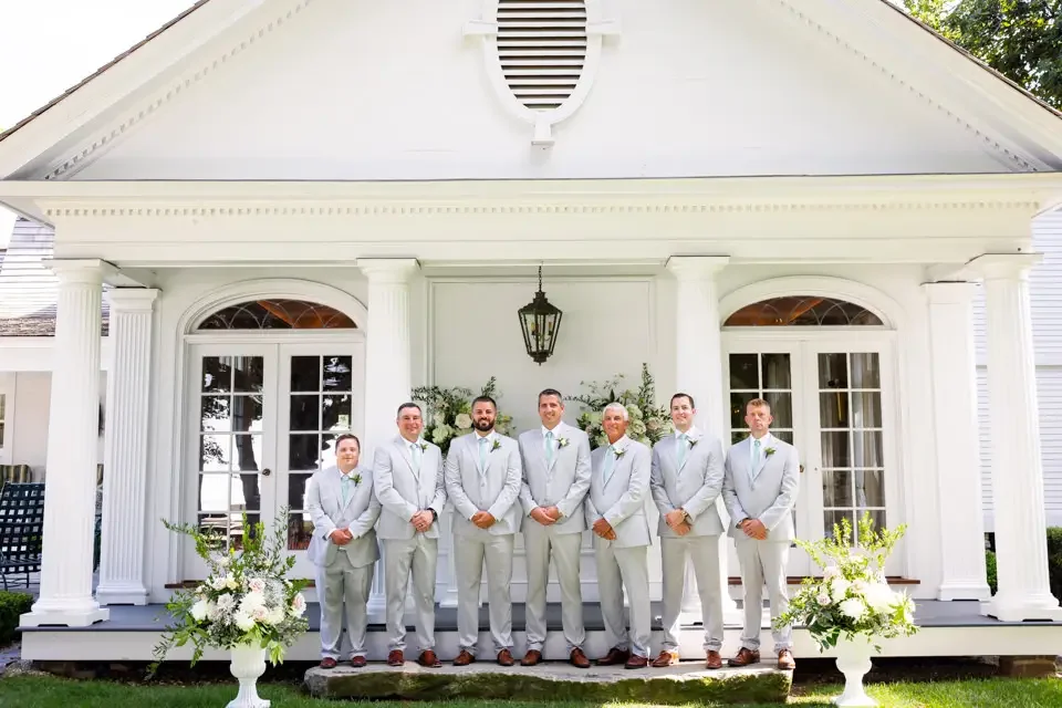 groomsmen-porch-wedding-portraits-smith-farm-gardens.webp