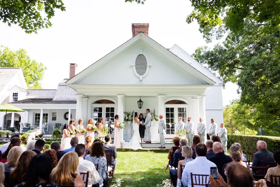 outdoor-wedding-ceremony-at-farmhouse-venue.webp