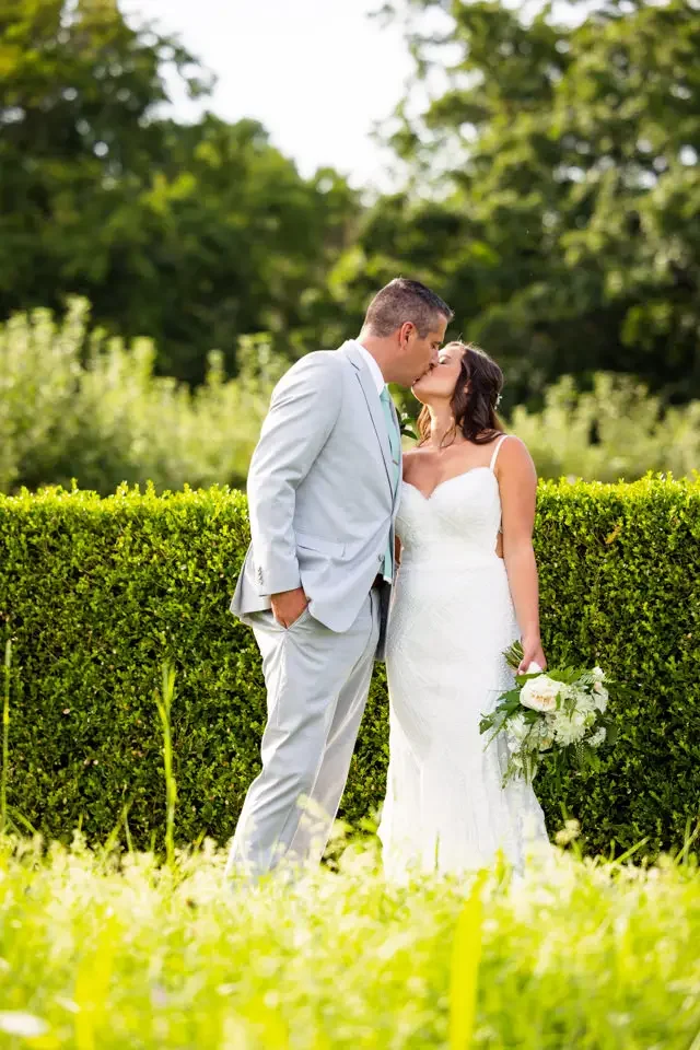 bride-and-groom-hedge-portraits-smith-farm-gardens.webp