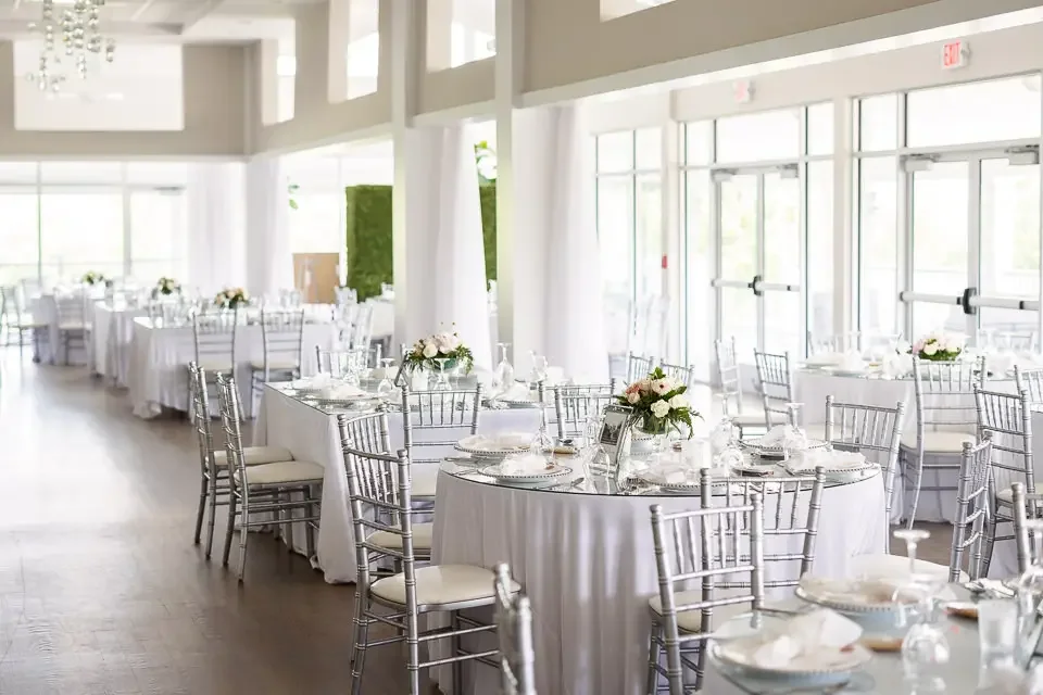Bright Wedding Reception Setup with White Décor