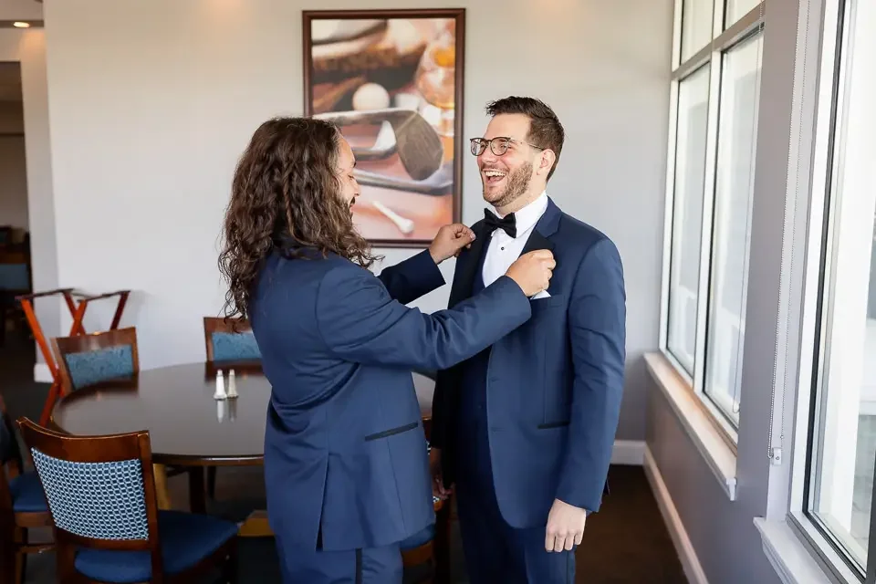 Groom Getting Ready with Groomsman Before the Wedding