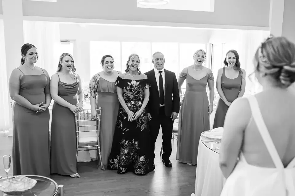 Emotional First Look with Bridesmaids and Family