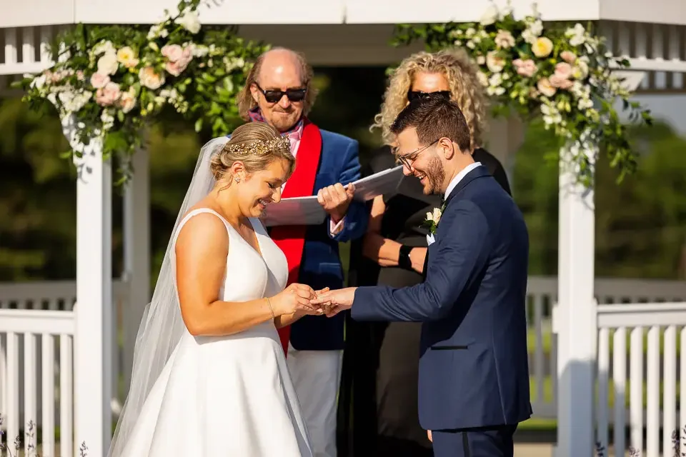 Exchanging Rings During Outdoor Wedding Ceremony