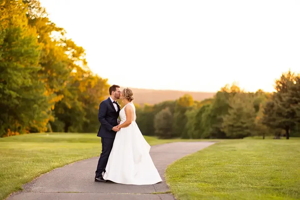 Golden hour wedding portraits at sunset