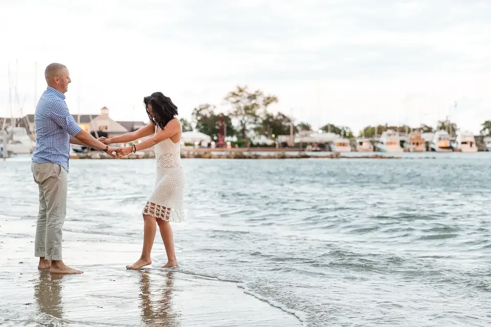 Playful Waterfront Engagement Photos in the Water