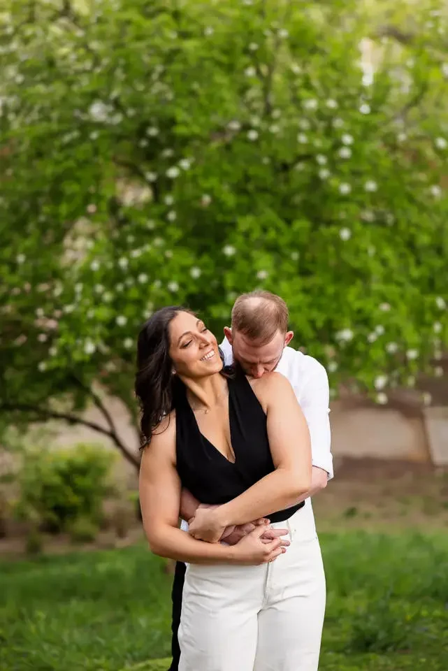 Intimate Embrace During Astoria Park Engagement