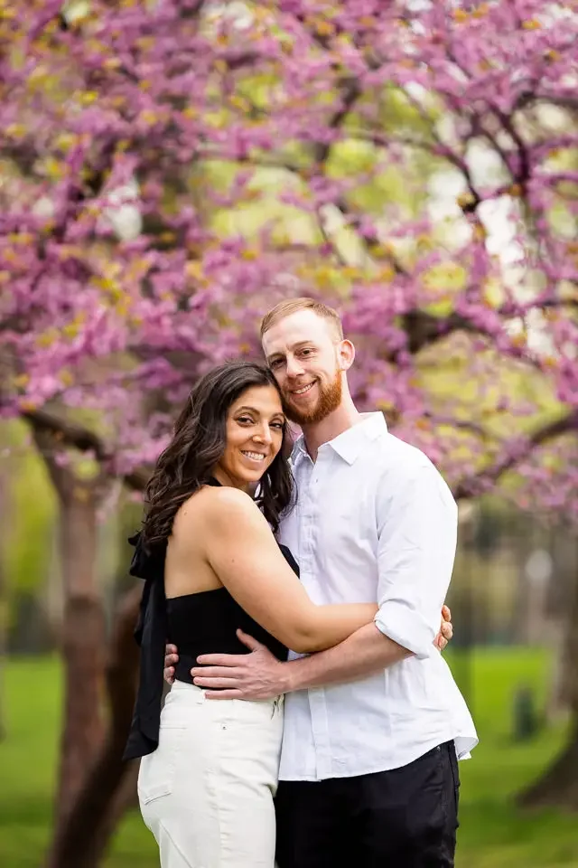 Spring Engagement Portrait Under Blooming Trees
