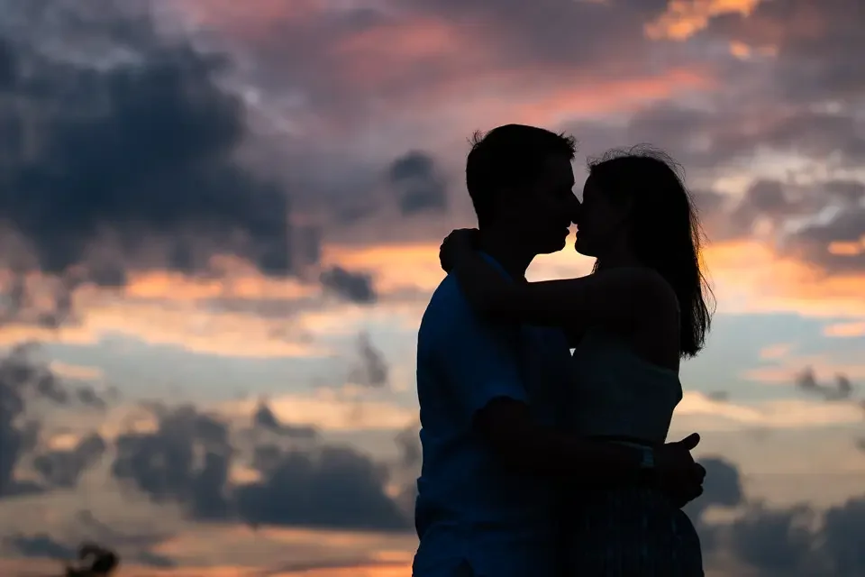 Romantic Sunset Silhouette Engagement Photo