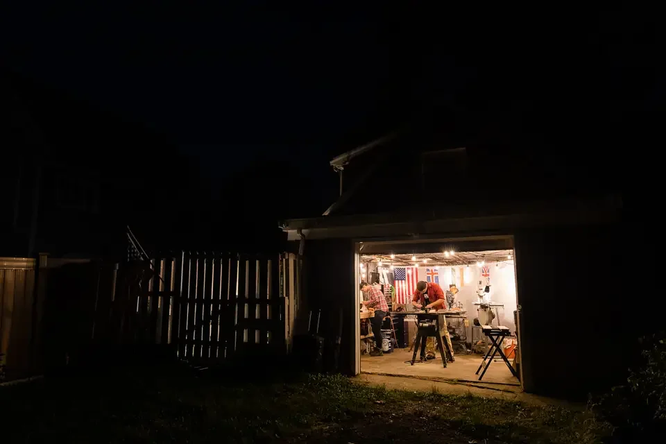 At-Home Engagement Session in a Backyard Workshop at Night
