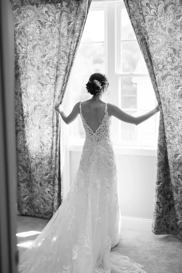 Bride at Window – Wedding Portrait