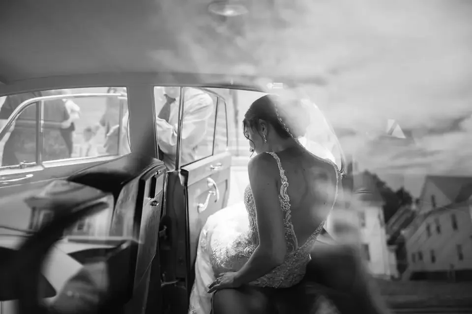 Bride in Vintage Wedding Car